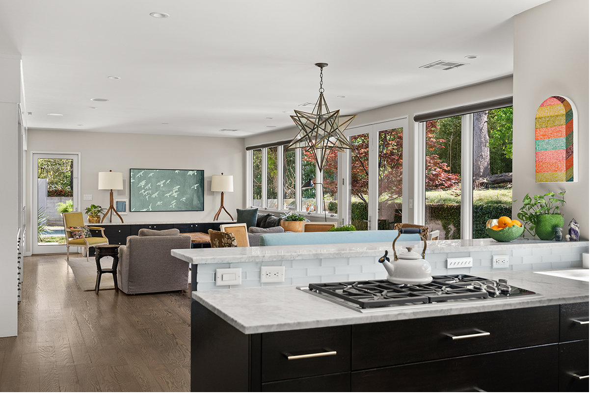 Great room with Moravian star pendant and floor-to-ceiling glass